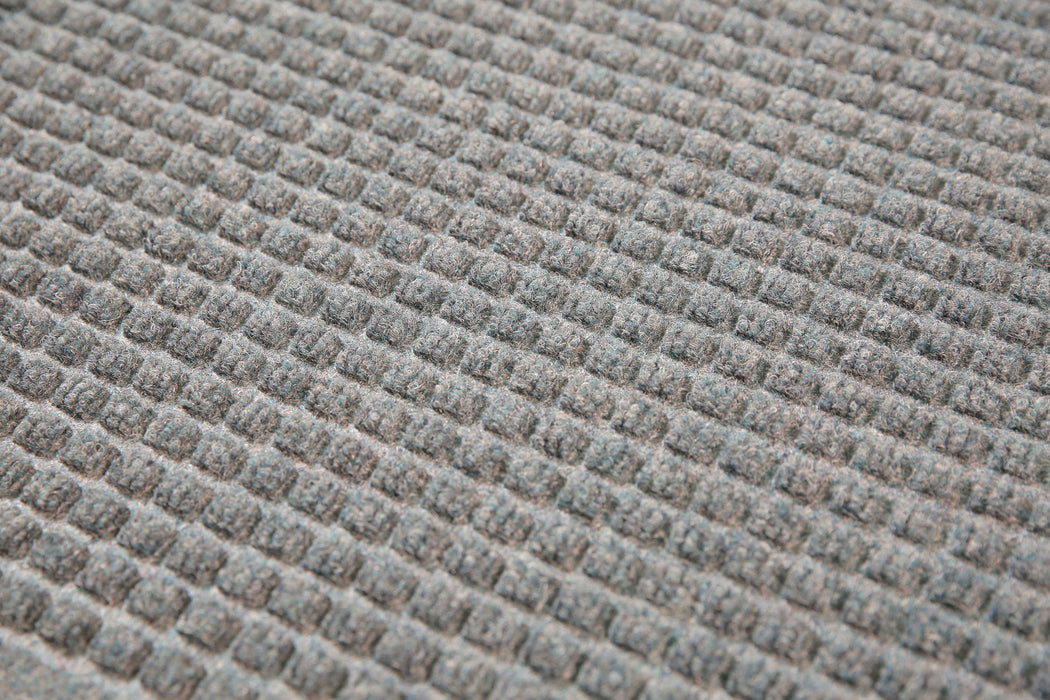 Close up image of the "waffle" like material of the Waterhog Classic Mat. The Mat Group UK.
