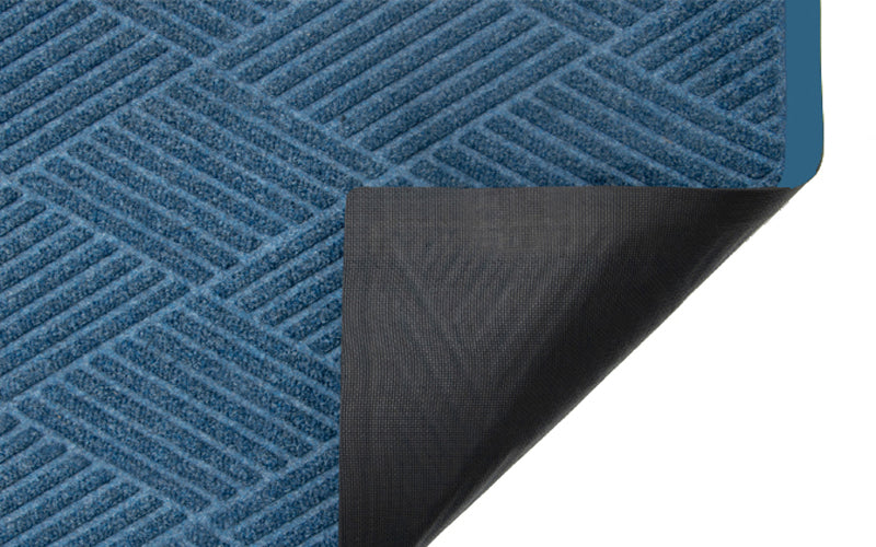 The Waterhog fashion mat has polyester edges but still has a rubber backing. The Mat Group UK.