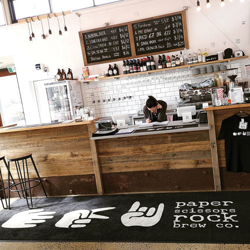 Insitu product image of PrintPlush Logo Mat at a cafe. The Mat Group UK.