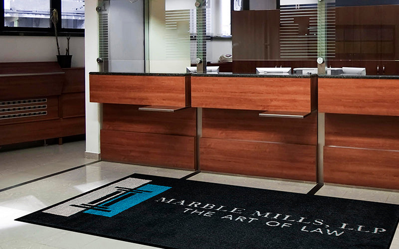 Insitu image of the PrintPlush Logo Mat used in an entrance area of a Law Firm. The Mat Group UK.