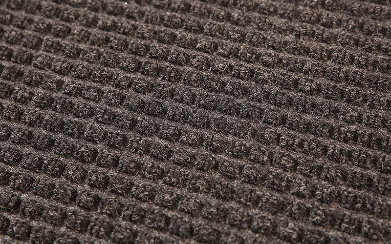 Close up image of the charcoal Waterhog Fashion Mat which is perfect for prestige entrances. The Mat Group UK.