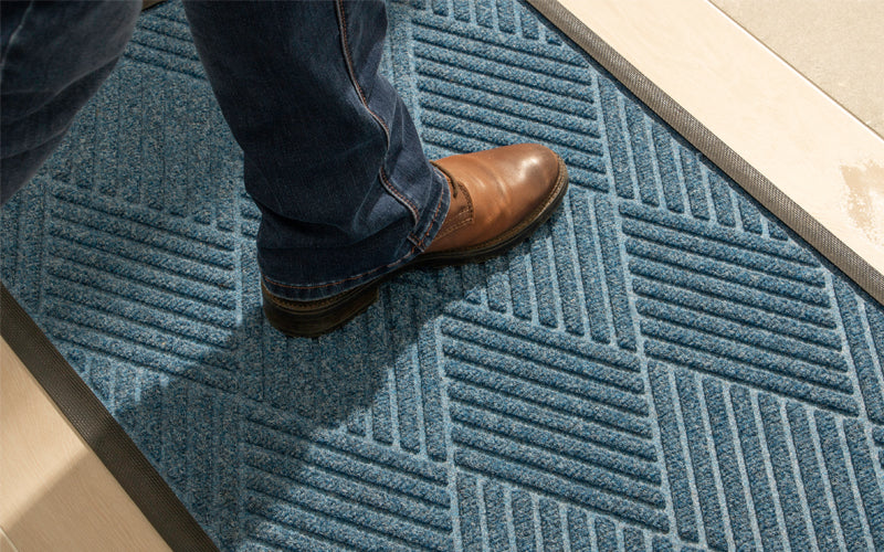 Insitu image of a Medium Blue Waterhog Premier Mat which dries quickly. The Mat Group UK.