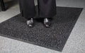 Insitu image of the Designer Scraper mat, perfect for scraping dirt, sand and moisture off shoes. The Mat Group UK.