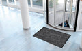 Insitu image of the cotton soaker mat used in a lobby entryway. The Mat Group UK.