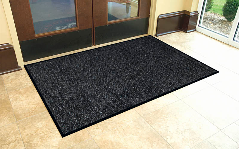 Insitu image of the Designer Scraper Mat in a school entrance area, perfect to trap dirt from students shoes to eliminate dirt tracks. The Mat Group UK.