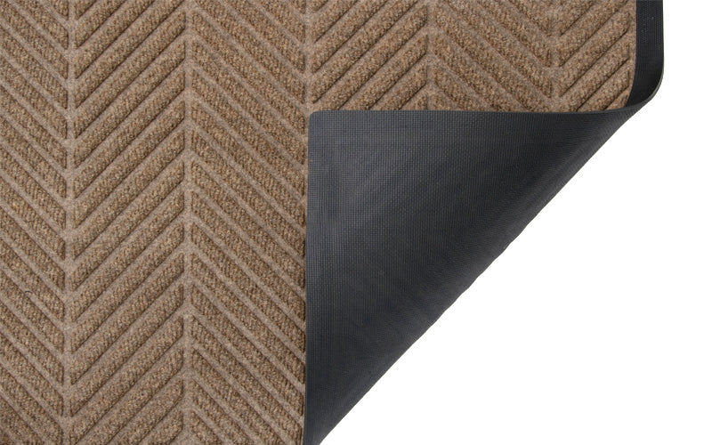 Corner image of the Camel Waterhog Eco Elite Mat with rubber edges and rubber backing. The Mat Group UK.