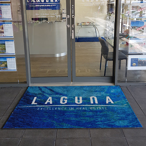 Insitu product image of High Def Printed Mat at real estate agent office entrance. The Mat Group UK.